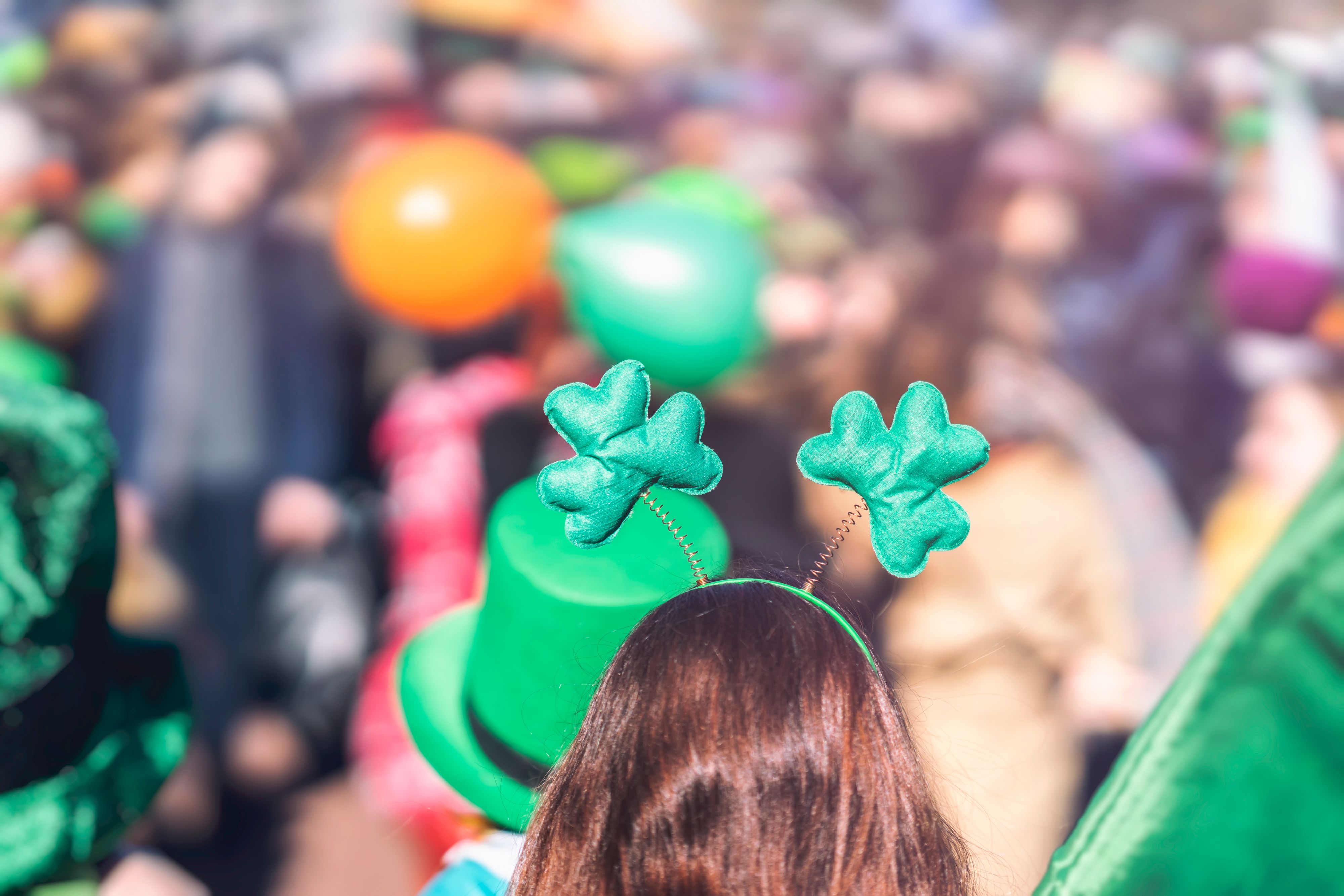 woman wearing shamrock headband